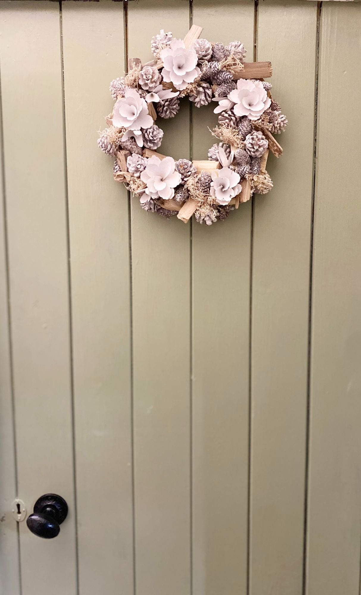 White Flowers & Pinecone Frosted Wreath